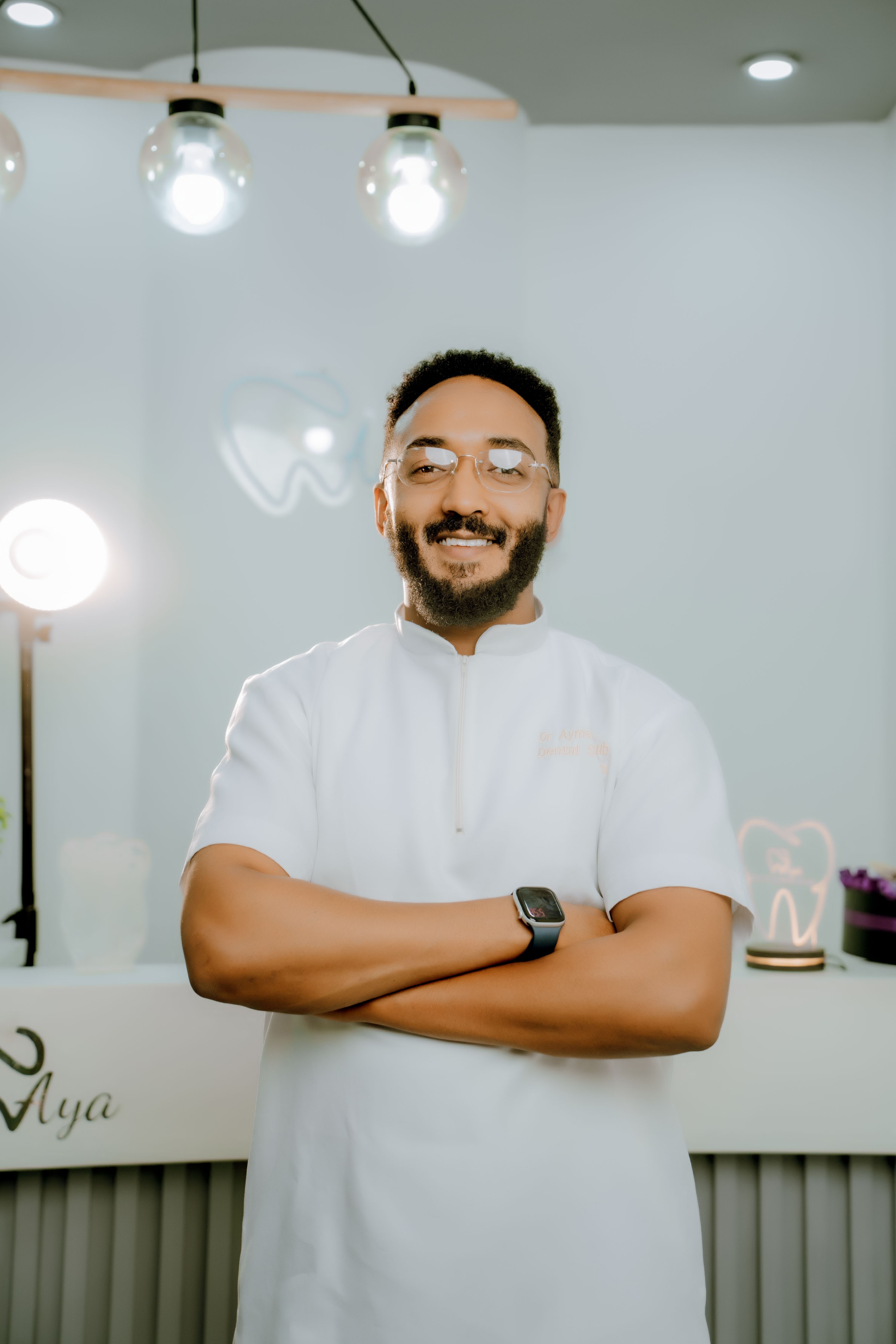 Dr. Aymen Ayoub, senior surgeon, endodontist, and cosmetic specialist at Aya Dental Studio